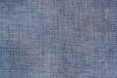 Mavi kumaşın dokusu. Çapraz dokuma. Boşluğu kopyala.