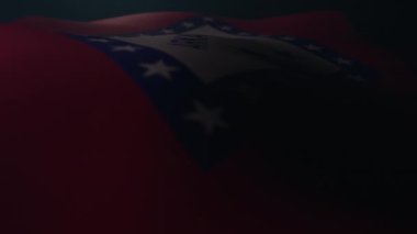 Arkansas bayrağı ağır çekimde karanlık bir atmosferde dalgalanıyor. Sonsuz döngü.