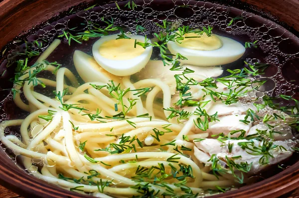 Soup with chicken, spaghetti, quail eggs and herbs close-up food background — Stock Image Soup Chicken Spaghetti Quail Eggs Herbs Close Food Background Royalty Free Stock Photos