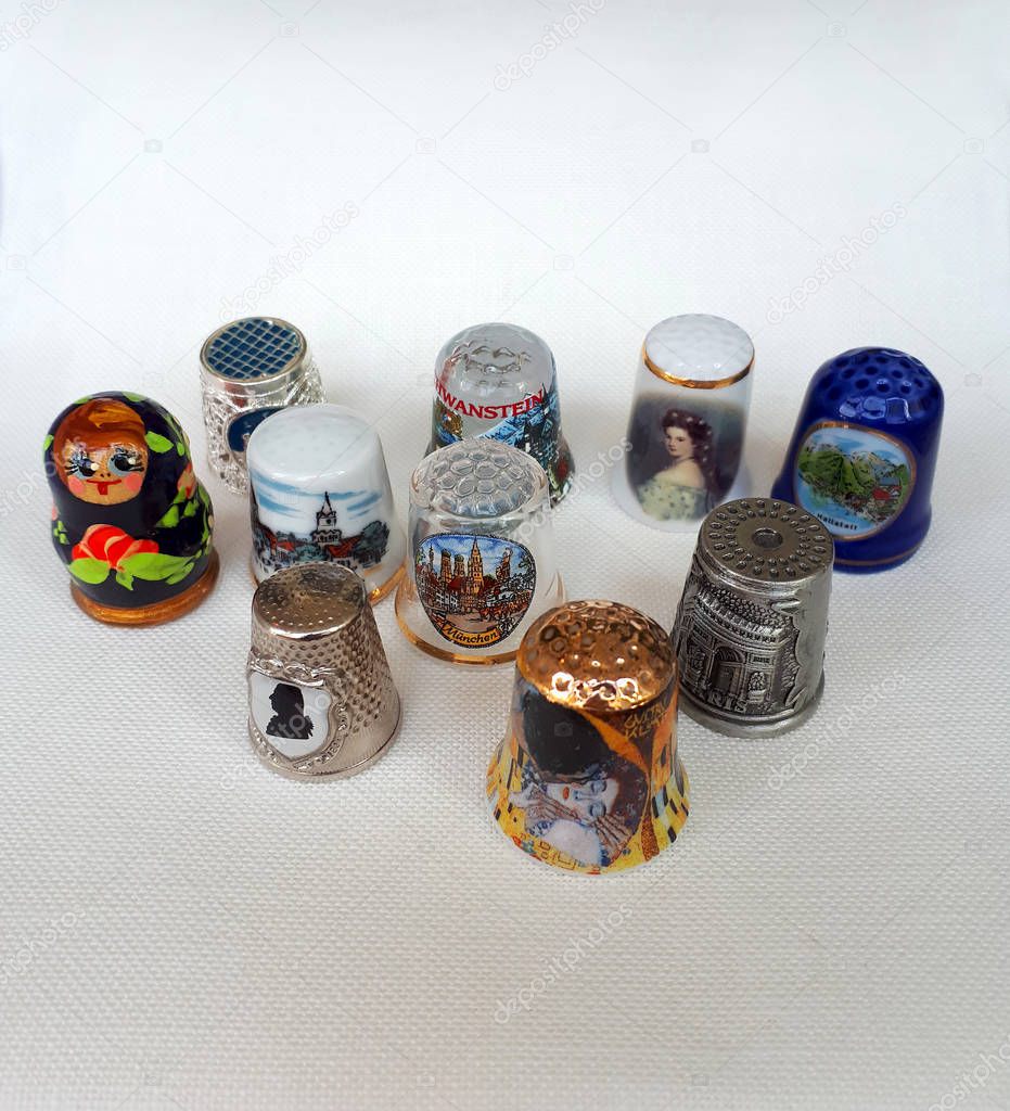 Beautiful thimbles. A small collection of thimbles from around the world. Assistant in sewing and embroidery. Decorative Souvenirs.
