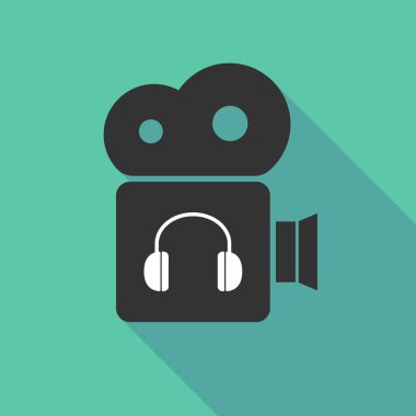 Uzun gölge sinema kamera ile bir kulaklık