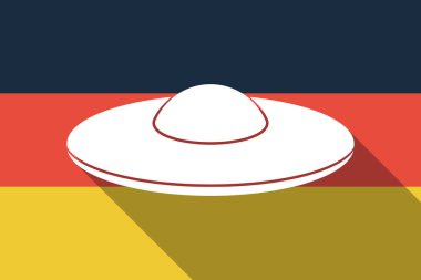 Uzun gölge Almanya bayrağı bir uçan daire Ufo ile