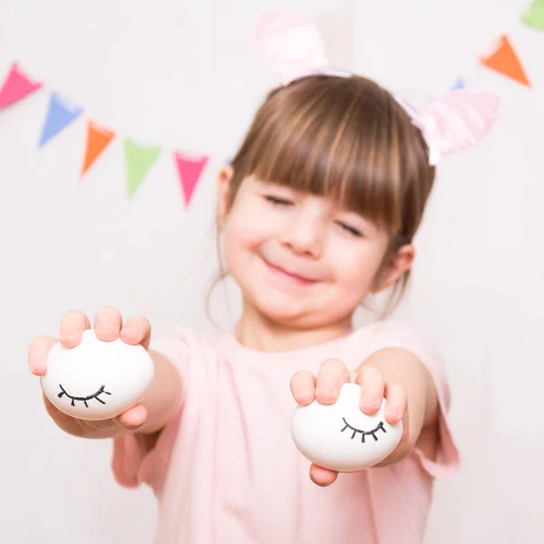 Cute Little Girl Wearing Bunny Ears Holding Painted Easter Eggs — Stock Photo, Image