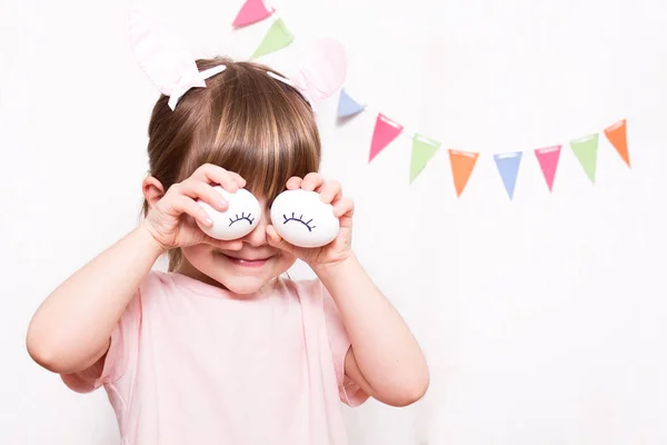 Cute Little Girl Wearing Bunny Ears Holding Painted Easter Eggs — Stock Photo, Image