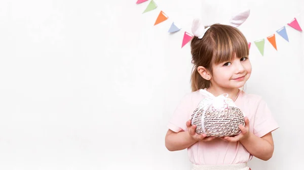 Cute Little Girl Wearing Bunny Ears Holding Painted Easter Eggs — Stock Photo, Image