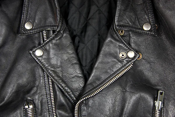 Schwarzes Leder mit Reißverschluss Stockfoto