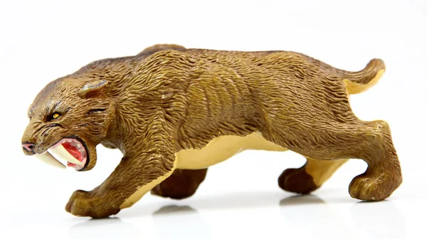 Toy saber-toothed tiger — Stock Photo, Image