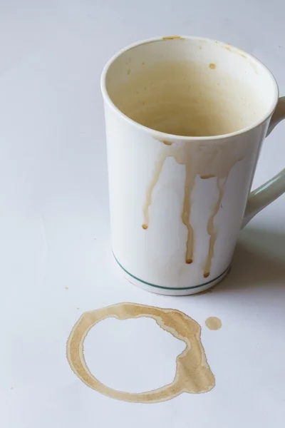 Dirty coffee cup on whire table — Stock fotografie