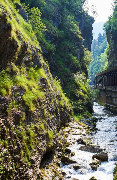 A canyon with a river under the street — Stock Photo, Image