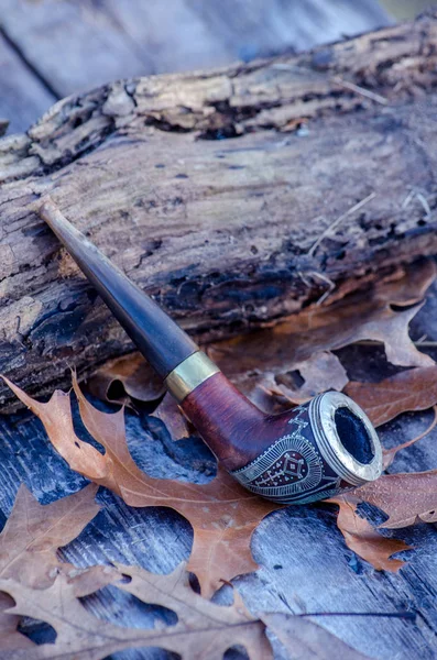 Antique Inlaid Pipe Leaning Weathered Log Some Old Fall Leaves — Stock Photo, Image