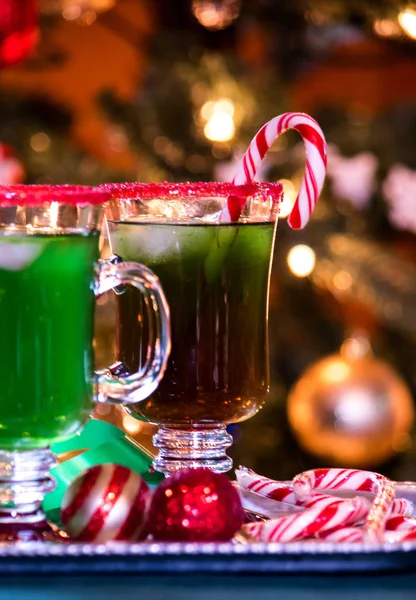 Christmas cocktails, with candy cane garnish — Stock Photo, Image