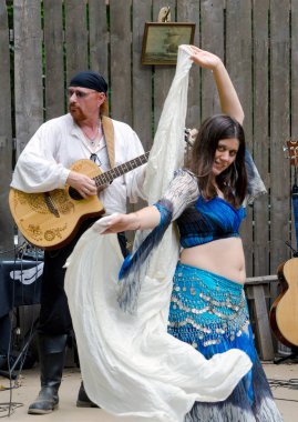 Holly Michigan, USA July 27 2014; people perform in costume at a Renaissance fair in Michigan USA