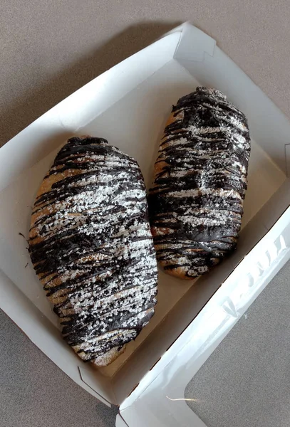 Chocolate croissants in a take out box — Stock Photo, Image