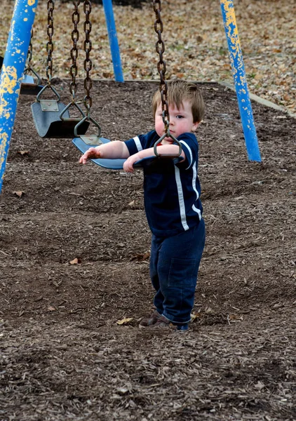 Young Boy Bit Upset Too Small Climb Tall Playground Swing — Stockfoto