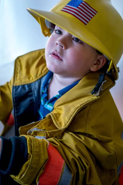 Young Boy Dresses Firefighter Costume Complete Hard Hat — Stockfoto