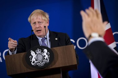 İngiltere Başbakanı Boris Johnson 17 Ekim 2019 'da Brüksel, Belçika' daki Avrupa Birliği Genel Merkezi 'nde düzenlenen bir basın toplantısında bir konuşma yaptı.. 