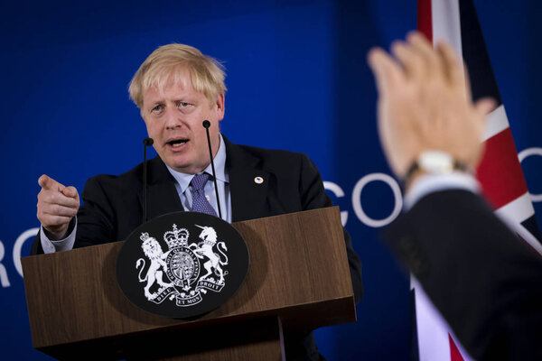 Britain's Prime Minister Boris Johnson addresses a press conference during an European Union Summit at European Union Headquarters in Brussels, Belgium on Oct. 17, 2019. 