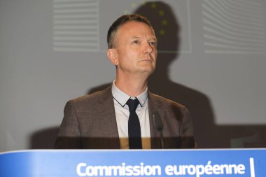 Eric Mamer Chief Spokesperson of the European Commission, and a Deputy Director-General at the Commission's DG Communication during a press briefing in Brussels, Belgium on Nov. 29, 2019 clipart