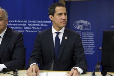Venezuelan opposition leader Juan Guaido speaks during a press conference at the European Parliament in Brussels, Belgium on Jan. 22, 2020. clipart