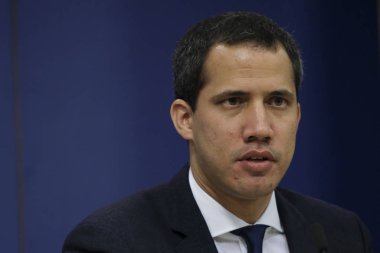 Venezuelan opposition leader Juan Guaido speaks during a press conference at the European Parliament in Brussels, Belgium on Jan. 22, 2020. clipart