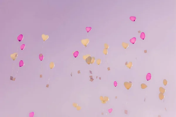 Heart love balloons fly into pink sky with ceremony wishes — Stock Photo, Image