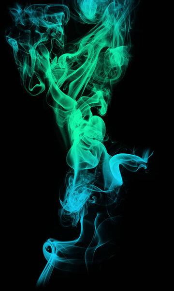 Acid neon cyan light blue green smoke on black background.