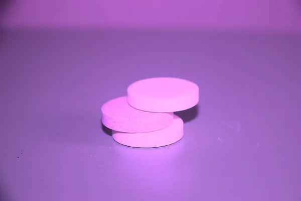 Three Pink Medicine Pharmaceutical Pills Purple Background Neon Lights — Stock Photo, Image