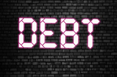 Borç pembe neon kelimesi siyah tuğla duvarda. Mali anlaşma kredi yükümlülükleri kavramı.