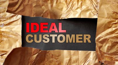 Ideal customer words under torn foil paper. Marketing research concept. clipart