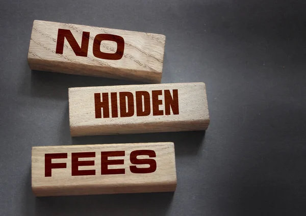 No hidden fees word written on wood block. Taxes and fees Financial business concept
