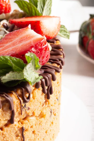 cake anthill with strawberries and nuts