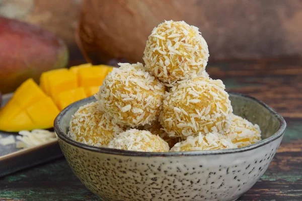 Mango coconut date oat energy balls