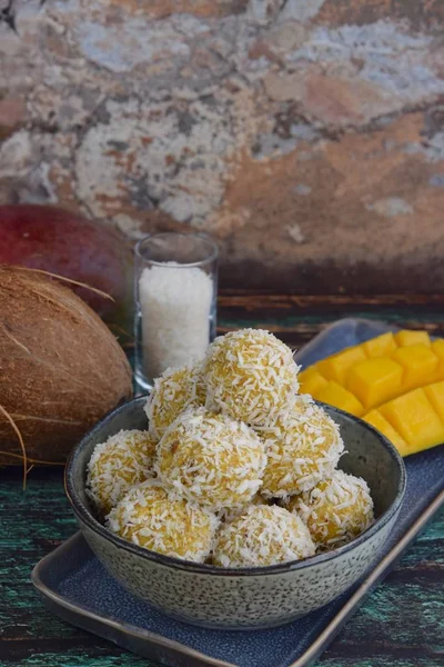 Mango coconut date oat energy balls