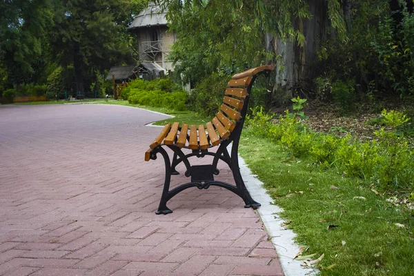 Empty bench in an empty park