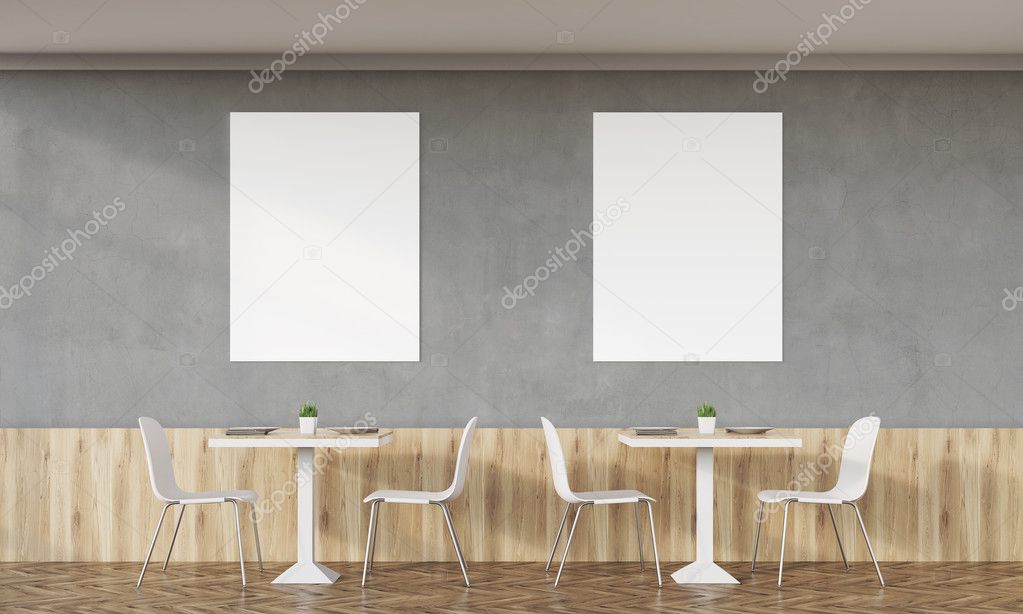 Family cafe with two posters and concrete walls