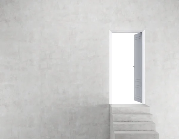 Porte ouverte en mur de béton avec escalier — Photo