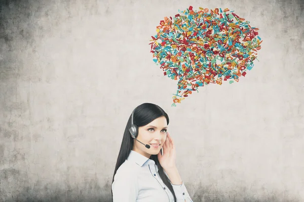 Woman with headset and speech bubble — Φωτογραφία Αρχείου