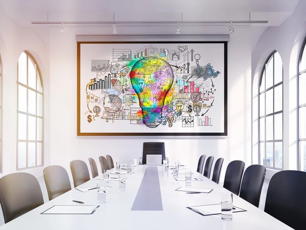 Light bulb poster in boardroom — Stock Photo, Image