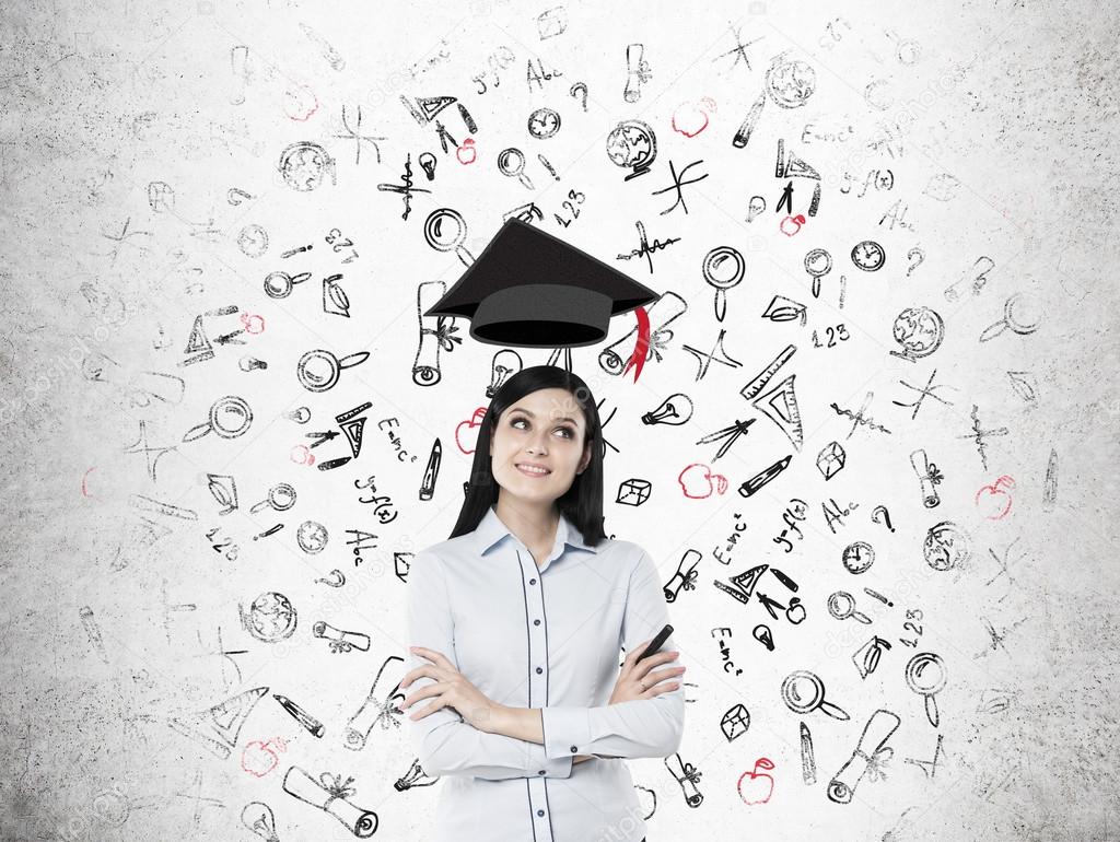Girl with levitating graduation hat and education sketches