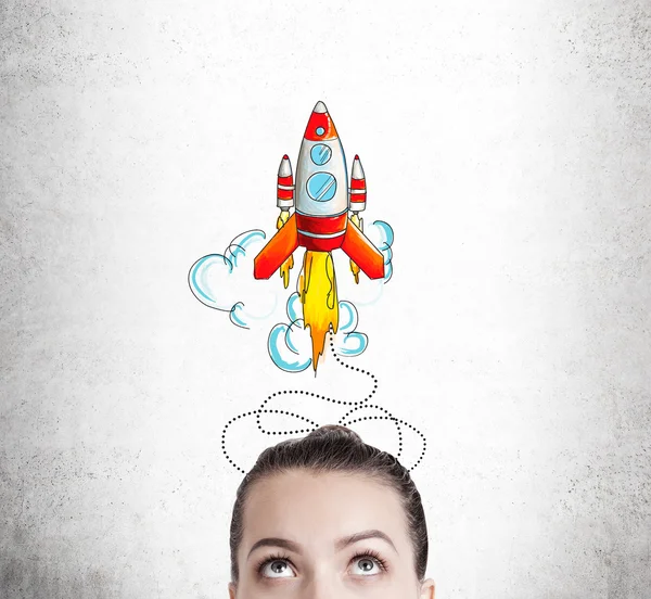 Woman's head and large rocket sketch — Stockfoto