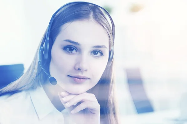 Businesswoman in headphones — Stock Photo, Image