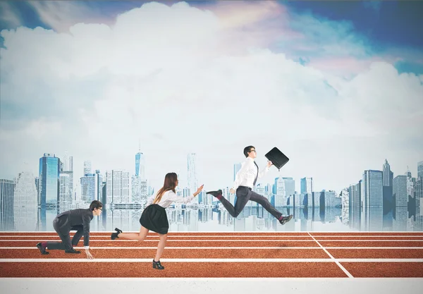 Business people running. Cloudy sky, city view — Stock Photo, Image