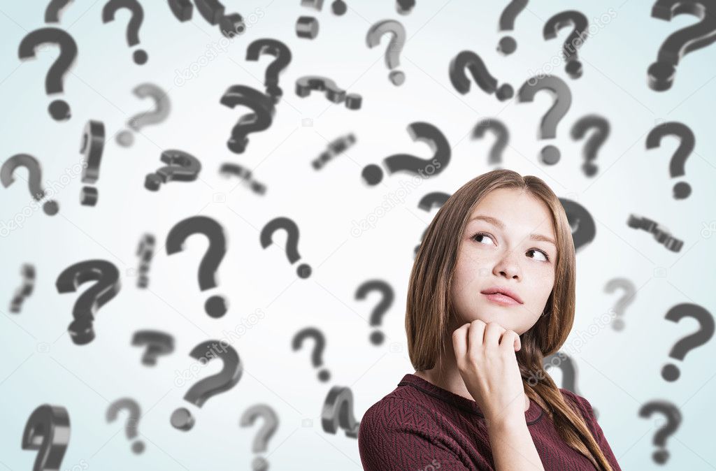 Young girl with braided hair and floating question marks