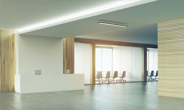 İki toplantı odasının ve güneşli resepsiyon masasının yan görünümü