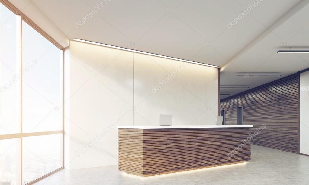 Side view of wooden sunlit reception counter