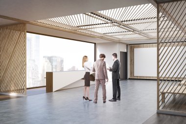 Bekleme yeri büyük posteri ile konuşan insanlar