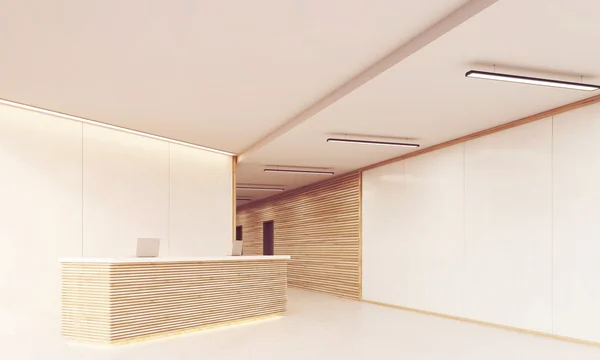 Reception desk in long sunlit corridor — Stock Photo, Image
