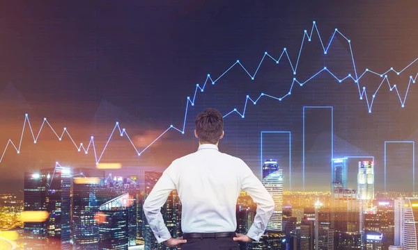 Man looking at city with graphs in the sky, toned — Stock Photo, Image