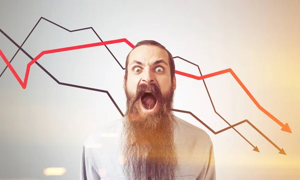 Hombre gritando a los gráficos en declive, tonificado — Foto de Stock