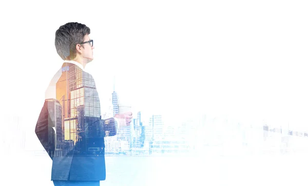 Side view of businessman looking at foggy city — Stock Photo, Image